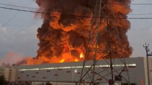 Fireball rises above a Wildberries logistics building after a Ukrainian drone strike in southern Russia
