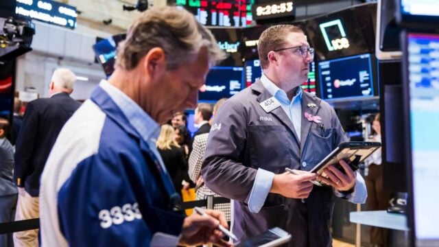 Stock futures little changed as traders weigh earnings, Fed